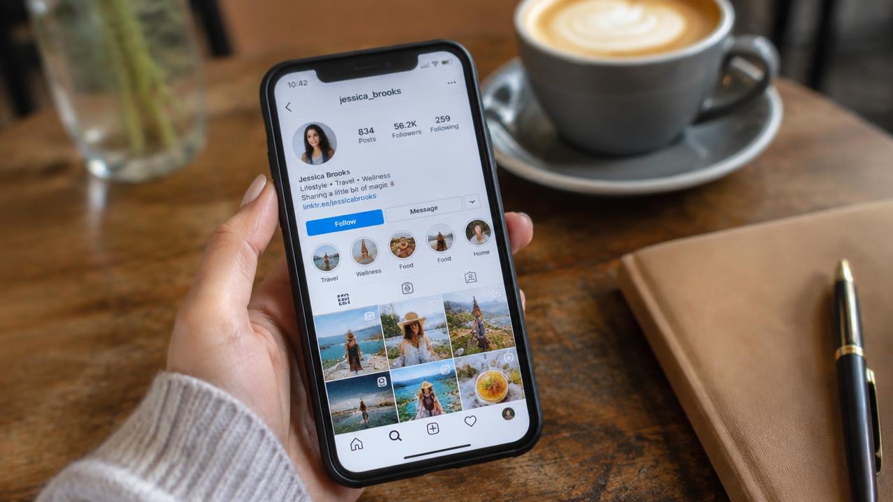 Smartphone showing an Instagram profile with a link in bio