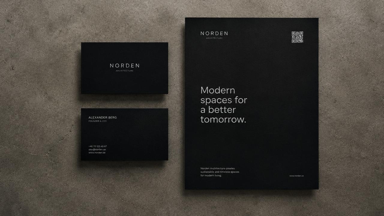 Minimal black business cards and a flyer with a QR code